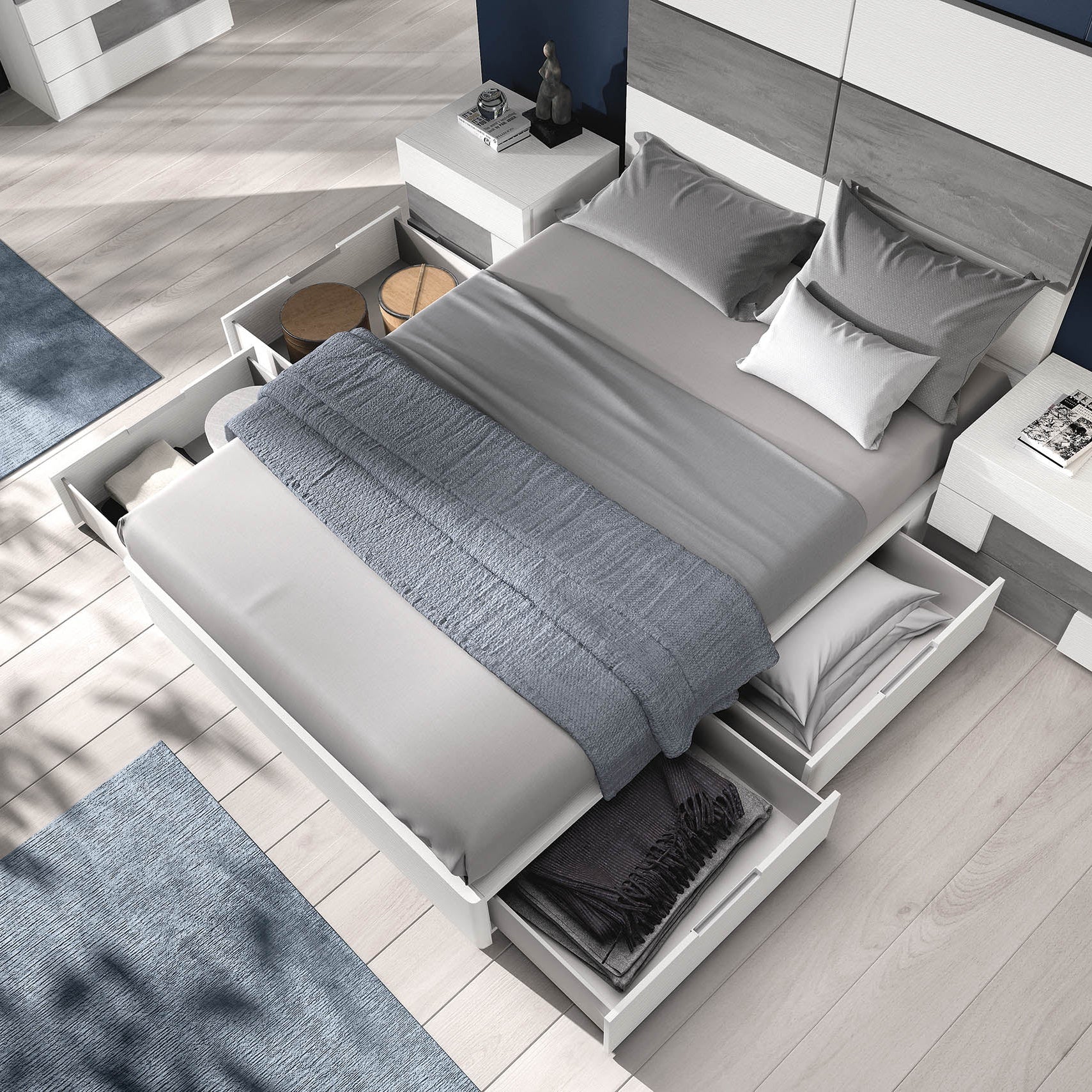 Lit avec des tiroirs en dessous, bien pratiques pour gagner de l'espace de rangement