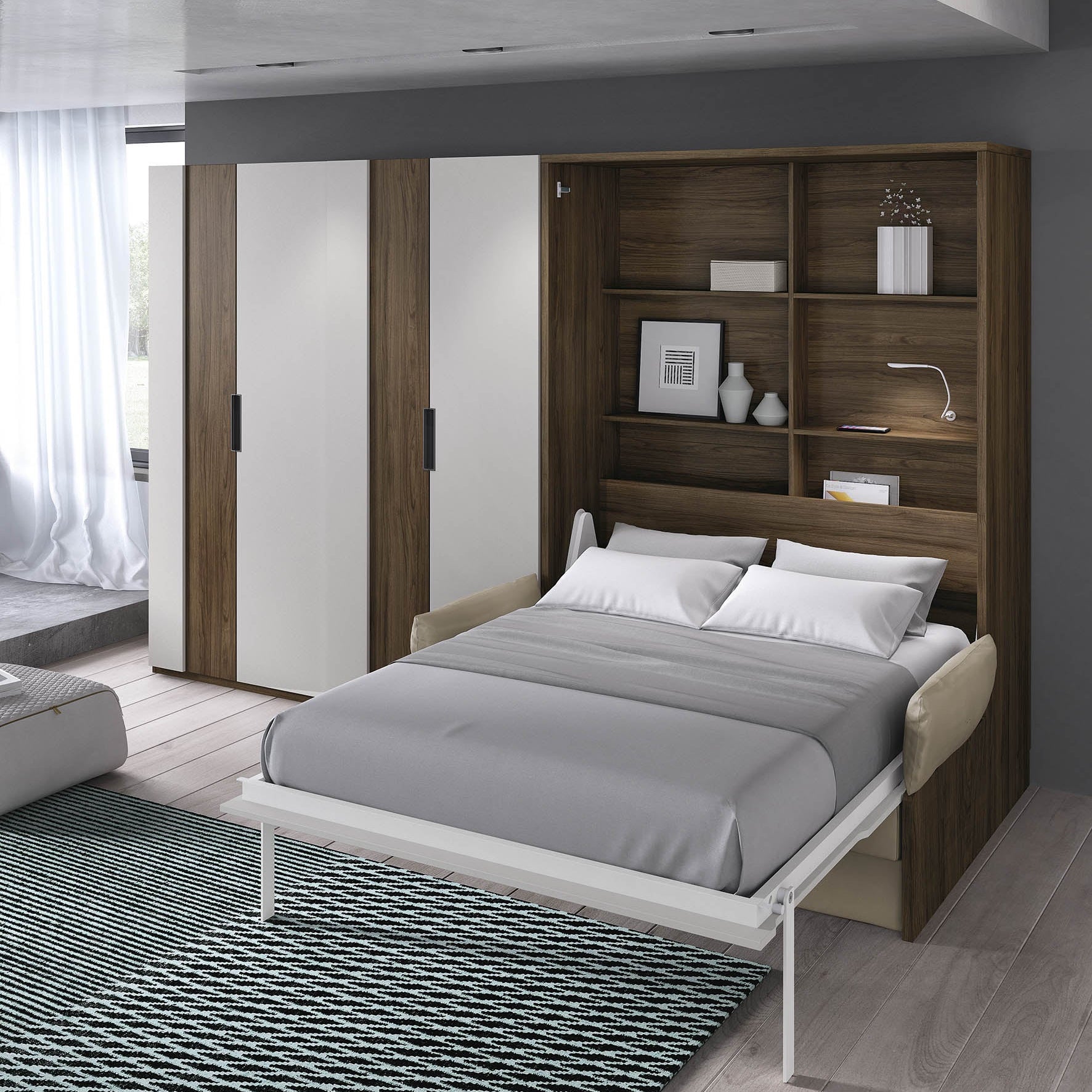 Lit qui se trouve dans une armoire verticale est qui peu être baissé pour optimiser les espaces