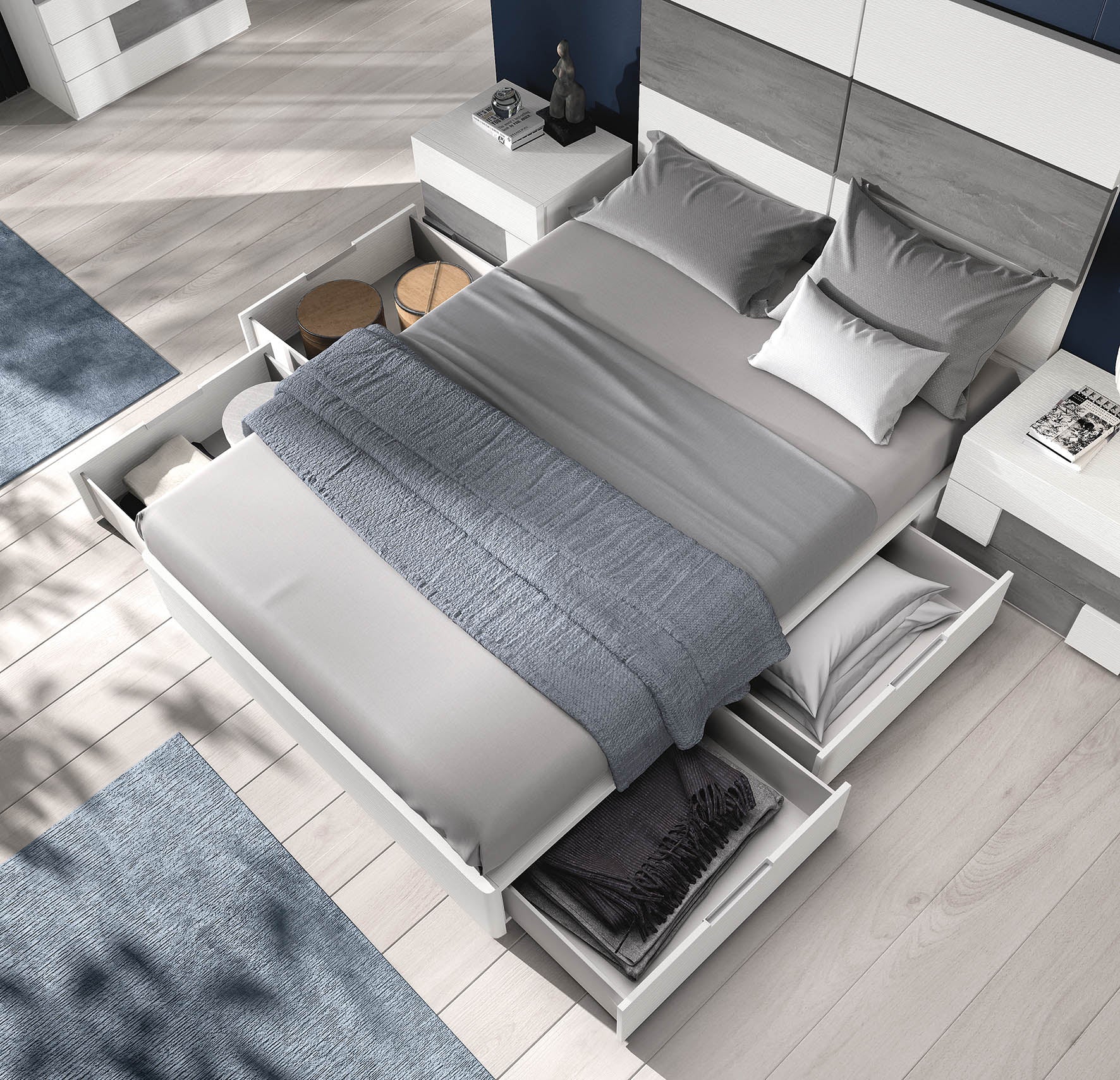 Lit avec des tiroirs en dessous, bien pratiques pour gagner de l'espace de rangement